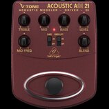 Vínový kytarový pedál s nápisy V-TONE ACOUSTIC ADI 21 a ACOUSTIC MODELER - DRIVER - DI. Zařízení má šest otočných ovladačů s popisky TREBLE, MID, BAS…