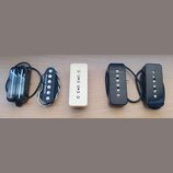 Fotografie zobrazuje pět elektrických snímačů kytary v různých provedeních. Zleva jsou dva černí humbuckery s nápisem Seymour Duncan, jeden krémový j…