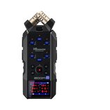 Černý digitální záznamník s nápisy H6essential a Handy Recorder. Na zařízení je viditelné logo zoom a modrý štítek s textem 32-bit Float. Přístroj má…