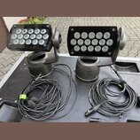 Dvě černé LED reflektory na pohyblivých ramenech umístěné na černém transportním kufru. Na spodní části obou zařízení je vidět nápis "TOSCH". K příst…