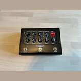 Černý kytarový efekt pedál s nápisem IRONHEART LOUDPEDAL. Na horní části jsou ovládací knoflíky s popisky VOLUME, GAIN 2, VOLUME, GAIN 1 a BOOST, dál…