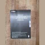 Fotografie znázorňuje černý obal uživatelské příručky. V horní části je bílé logo YAMAHA a nápisy DIGITÁLNÍ KLAVIATURA, DIGITAL KEYBOARD, PSR E453 a…