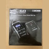 Fotografie krabice od bezdrátového systému značky BOSS s označením WL-60. Na obalu je nápis Wireless Freedom, Easy Visual Set Up a obrázky vysílače i…