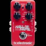 Červený kytarový efekt s nápisem HALL OF FAME REVERB a logem tc electronic®. Na horní straně jsou tři černé otočné knoflíky s popisky DECAY, TONE a F…