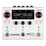 Bílý efektový procesor s nápisy Eventide, H90 a Harmonizer®. Zařízení má dva velké červeně vyznačené ovraty s popisky SELECT (BANK hold) a PERFORM, t…