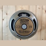 Kruhový reproduktor s kovovým rámem v šedé barvě. Na středovém štítku je uveden nápis CELESTION Vintage Series, model G12H a výkon 30W. Dole je uvede…