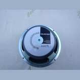 Kruhlový reproduktor s kovovým rámem. Na bílém středovém krytu je černý nápis PROFESSIONALLOUDSPEAKER a logo CELESTION. Dále je zde text Celestion In…