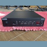Černý rackový audio přístroj s nápisy LE LAVRY ENGINEERING a DA10. Na předním panelu se nachází vypínač POWER, konektor HEADPHONE a ovládací prvky s…