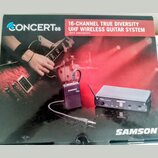 Fotografie krabice od bezdrátového systému pro kytaru. Na obalu je nápis CONCERT 88 a text 16-CHANNEL TRUE DIVERSITY UHF WIRELESS GUITAR SYSTEM. V po…