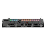 Šedý kytarový procesor s nápisy TECH 21 a FLY RIG. Na horní straně se nachází řada ovládacích knoflíků s popisky REVERB, LEVEL, REPEATS, TIME, LOOP,…