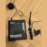 Černý DMX kontrolér s nápisy „DMX60“, „beamZ“ a „6 CHANNEL DMX CONTROLLER“. Zařízení má šest posuvníků s číslováním 1 až 6 a jeden hlavní posuvník oz…