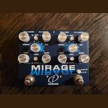 Modrý kytarový efekt s nápisem MIRAGE a logem crazy tube circuits. Zařízení má osm stříbrných otočných knoflíků s popisky swell, volume, voice, mix a…