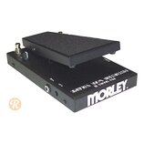 Černý kytarový pedál s nápisem MORLEY a označením PRO SERIES II DISTORTION WAH VOLUME. Nástroj má kovové tělo a horní stupňovitý pedál s texturovaným…