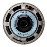Kytarový reproduktor s kovovým šedým rámem a světle modrým papírkem. Na papírku jsou nápisy „EVM 12L“, „The World's Greatest Guitar Speaker“, „Classi…