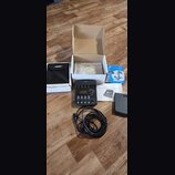 Sada audio příslušenství značky Bose v původním kartónovém balení. Obsahuje černý ovládací panel s nápisem Bose a označením 17 SoundMatch Audio Syste…