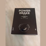 Černý obdélníkový kytarový pedál s nápisy POWER BRAKE, MAX 60W a logem WIDARA. Uprostřed se nachází černý otočný knoflík s označením min level a max…