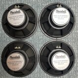 Čtyři černé kytarové reproduktory s bílými štítky. Na štítcích je uveden nápis Randall AMPLIFIERS, HIGH PERFORMANCE GUITAR SPEAKER a Model: RS12-50 8…