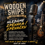 Reklamní grafika s nápisem WOODEN SHIPS a podtitulem HARD ROCK – BLUES. V textu je uvedeno: HLEDÁME ZPĚVÁKA / ZPĚVAČKU a dále požadavky na posilu na…