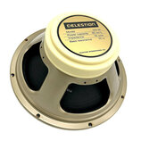 Kruhový reproduktor s krémovým magnetem a béžovým kovovým rámem. Na štítku je uveden nápis CELESTION, Model G12 M, Power capacity 65 WATTS, Impedance…