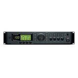 Černý rackový procesor s nápisem TC HELICON a označením VoicePrint G2. Zařízení má digitální displej zobrazující číslo 100 a grafické nastavení, cent…