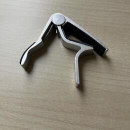 Kapodastr Dunlop Trigger Capo Acoustic Curved N