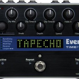 Černý efekt pedál s nápisy Eventide a TIMEFACTOR. Zařízení má deset otočných ovladačů s popisky Mix, Dly Mix, Dly Time A, Dly Time B, Fdbk A, Fdbk B,…