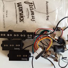 Sada elektroniky pro basovou kytaru v černém provedení. Obsahuje tři snímače s nápisem Sadowsky, potenciometry a zapojovací kabely v různých barvách.…