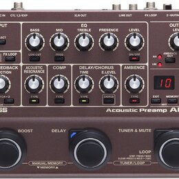 Hnědý kytarový předzesilovač s nápisy BOSS a Acoustic Preamp AD-10. Zařízení obsahuje řadu ovládacích potenciometrů, přepínačů a červené digitální di…
