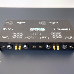Černá DI-box s nápisy CORDJAL SOUND & AUDIO EQUIPMENT, DI-BOX a 2 CHANNELS. Na horní straně je označení modelu CES02 a přepínače pro GND (OFF/ON) a B…