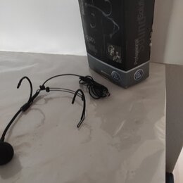Na fotografii je černý headset s mikrofonem a doprovodná krabice. Na černé krabici je nápis Professional SoundSolutions a modelové označení C920L. Ka…