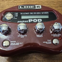 Vínový efektový procesor s nápisy LINE 6 a pocket POD. Zařízení má čtyři chromované otočné ovladače s popisky EFFECTS MID, DELAY TREBLE a CHAN VOL RE…