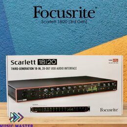 Fotografie znázorňuje krabici od USB audio rozhraní. Na obalu je nápis Scarlett 18i20 a text THIRD-GENERATION 18-IN, 20-OUT USB AUDIO INTERFACE spolu…