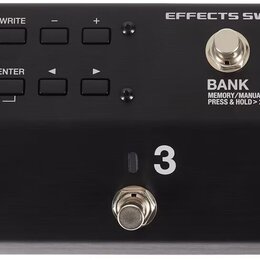 Černý efektový spínač s nápisem EFFECTS SWITCHING SYSTEM ES-5 a logem BOSS. Zařízení má pět stomečovacích spínačů označených čísly 1 až 5, displej a…