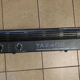 Černý rackový koncový zesilovač s nápisem TA2400 a logem the camp. Na předním panelu je text PROFESSIONAL POWER AMPLIFIER - MK-X a v horní části FULL…