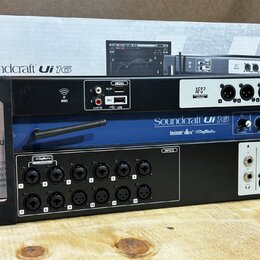 Černý rackový digitální mixážní pult s nápisem Soundcraft Ui 16. Horní panel obsahuje sekci MEDIA s konektory LINE IN, USB a REC, WiFi indikátor a čt…