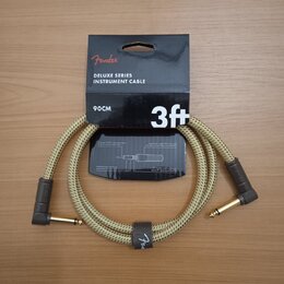 Bežový pletený instrumentální kabel s hnědými konektory a zlatými hroty. Na balení je uveden nápis Fender DELUXE SERIES INSTRUMENT CABLE, 3ft a 90CM.…