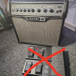 Černý kytarový kombo zesilovač s nápisem LINE 6 a označením modelu SPIDER IV 15. Před zesilovačem je umístěn černý nožní spínací pedalboard značky LI…