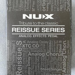 Krabice efektového pedálu značky NUX z řady REISSUE SERIES. Na přední straně je bílý nápis NUX a text Tribute to the classic ANALOG EFFECTS PEDAL. Po…