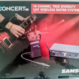Fotografie krabice od bezdrátového systému pro kytaru. Na obalu je nápis CONCERT 88 a text 16-CHANNEL TRUE DIVERSITY UHF WIRELESS GUITAR SYSTEM. V po…