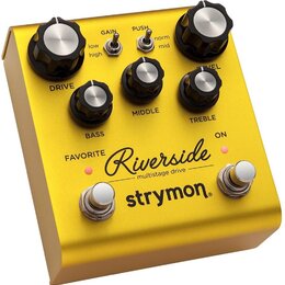 Zlatý kytarový efekt s nápisy Riverside multistage drive a strymon. Na horní straně jsou čtyři černé otočné knoflíky s označením DRIVE, BASS, MIDDLE…