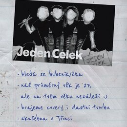 Fotografie zobrazuje papírový inzerát s černobílou fotografií čtyř osob v černém oblečení. Pod fotografií je velkým písmem nápis Jeden Celek a ručně…