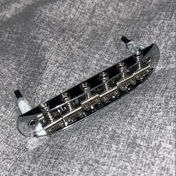 Fender kobylka 7,25" (Jaguar, Jazzmaster, Mustang)