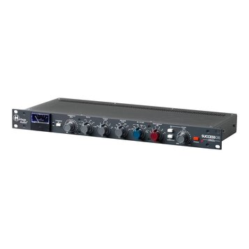 Černý rackový studiový kompresor s nápisy Heritage Audio a SUCCESSOR STEREO BUS COMPRESSOR. Přední panel obsahuje analogový VU metr, pět šedých a dva…