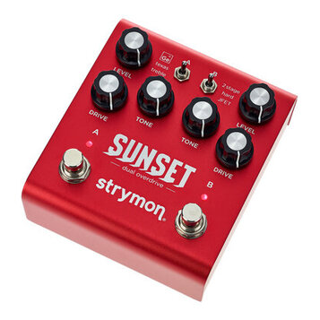 Červený efekt pedál s nápisy SUNSET a dual overdrive. Na spodní části je bílé logo strymon. Pedál má dva stomečové spínače s popisky Ge texas treble…
