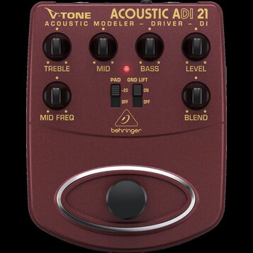 Vínový kytarový pedál s nápisy V-TONE ACOUSTIC ADI 21 a ACOUSTIC MODELER - DRIVER - DI. Zařízení má šest otočných ovladačů s popisky TREBLE, MID, BAS…