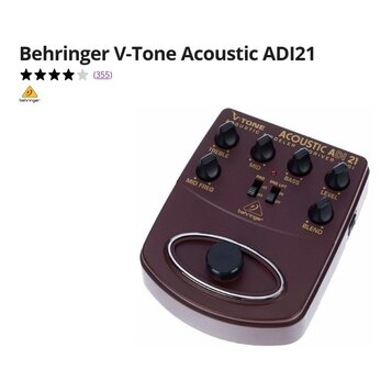 Hnědý efekt pedál s bílým spodním základem. Na horní části je nápis V-TONE ACOUSTIC MODELER DRIVER a ACOUSTIC ADI 21, dále logo behringer. Zařízení m…