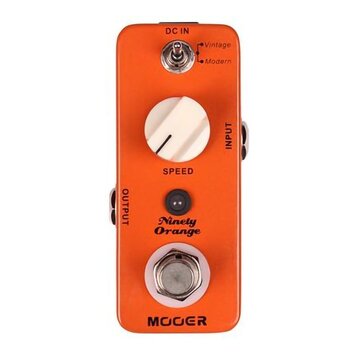 Oranžový efekt pedál s bílým oválným knoflíkem označeným nápisem SPEED. Na horní části je přepínač s popisky Vintage a Modern a vstup DC IN, ve spodn…
