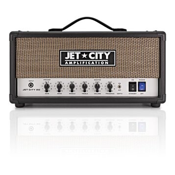 Černý kytarový kombozesilovač s hnědou texturovanou přední síťovkou. Na síťovce je umístěno logo JET CITY AMPLIFICATION a na ovládacím panelu nápis J…