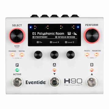 Bílý efektový procesor s nápisy Eventide, H90 a Harmonizer®. Zařízení má dva velké červeně vyznačené ovraty s popisky SELECT (BANK hold) a PERFORM, t…