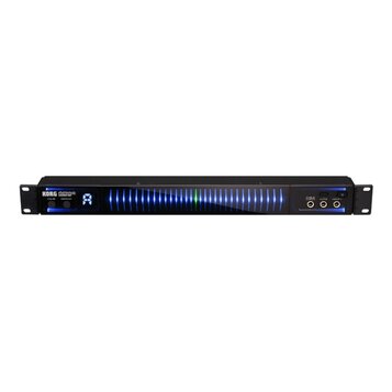 Černý rackový ladič s modrým podsvícením. Na levé straně je nápis KORG pitchblack Pro a tlačítka CALIB a DISPLAY. Vprostřed je LED indikátor ladění s…